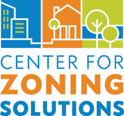 The Center for Zoning Solutions logo, with illustrations of housing, mixed use buildings and trees, in green, orange, and blue